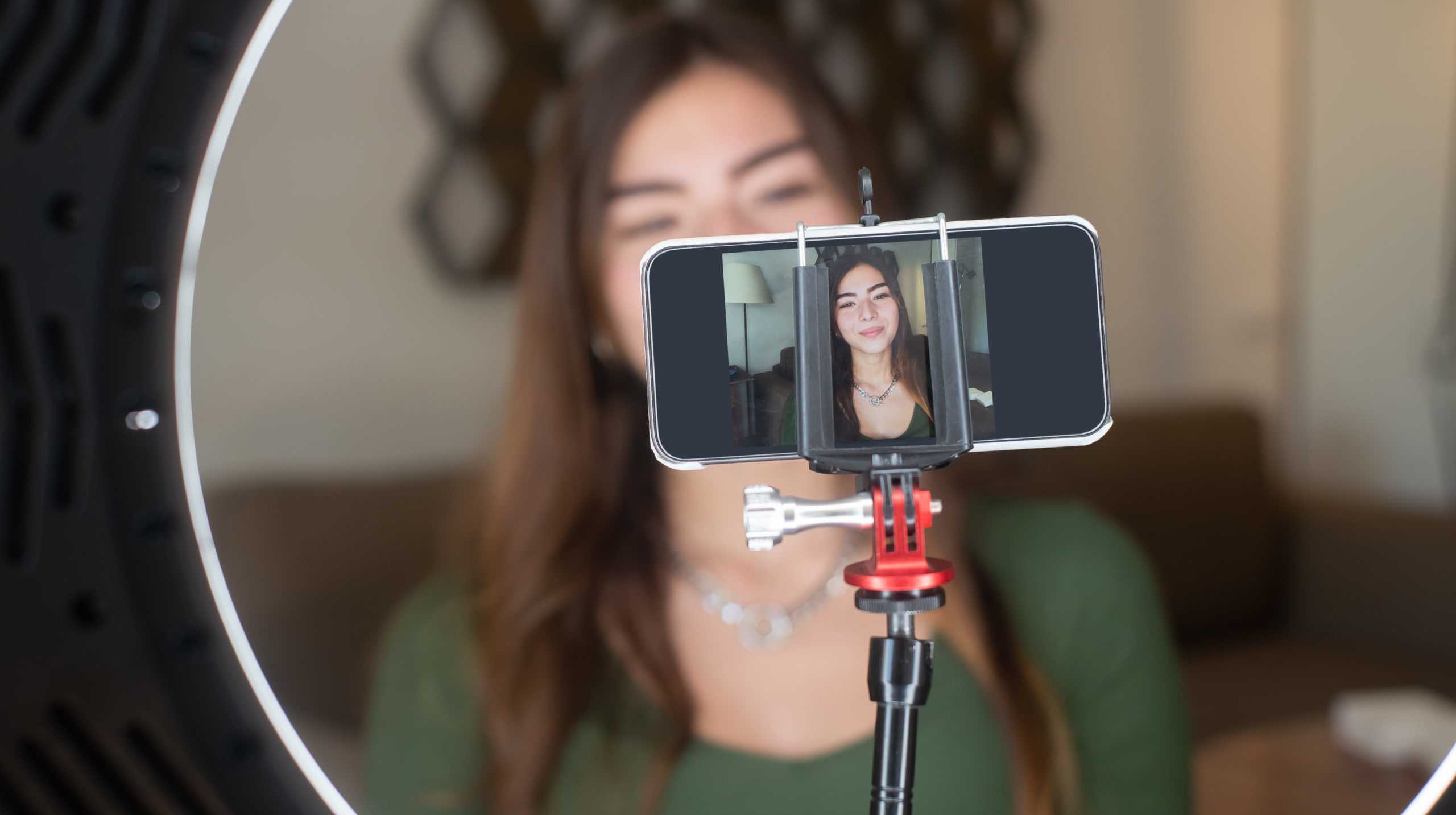 A woman using a smartphone in blogging