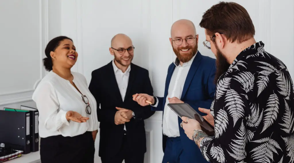 Business people in a light mood inside an office