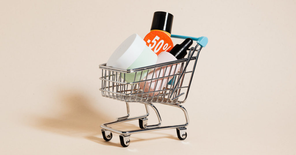 Cosmetic bottles in a shopping cart